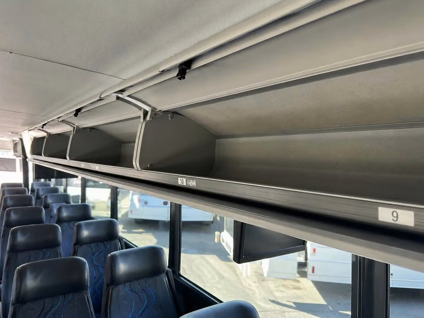 crown point 25 passenger minibus overhead storage