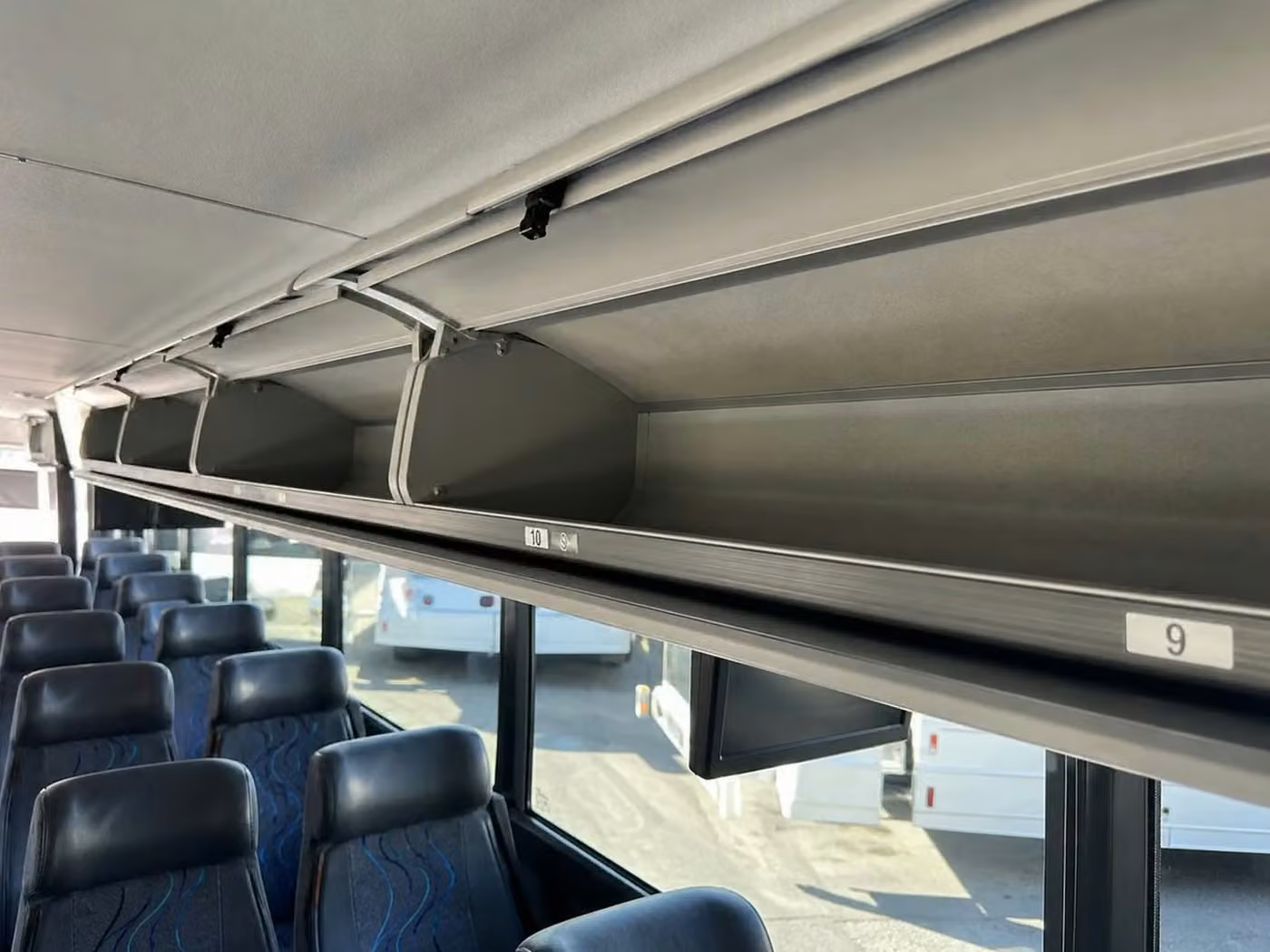 crown point charter bus overhead storage